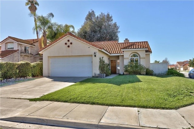 mediterranean / spanish-style house featuring a front yard, stucco siding, a chimney, concrete driveway, and a tiled roof