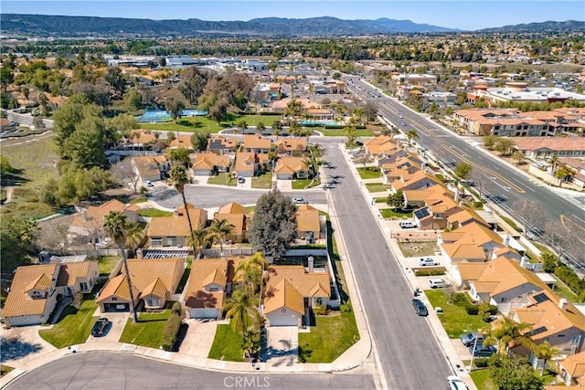 bird's eye view featuring a residential view and a mountain view