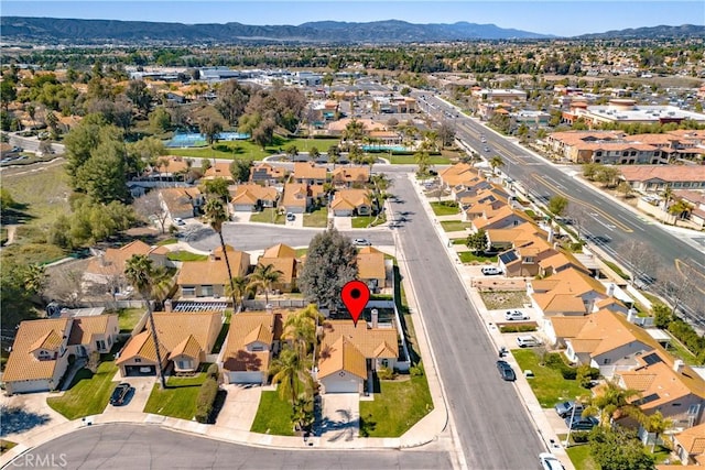 aerial view with a mountain view and a residential view