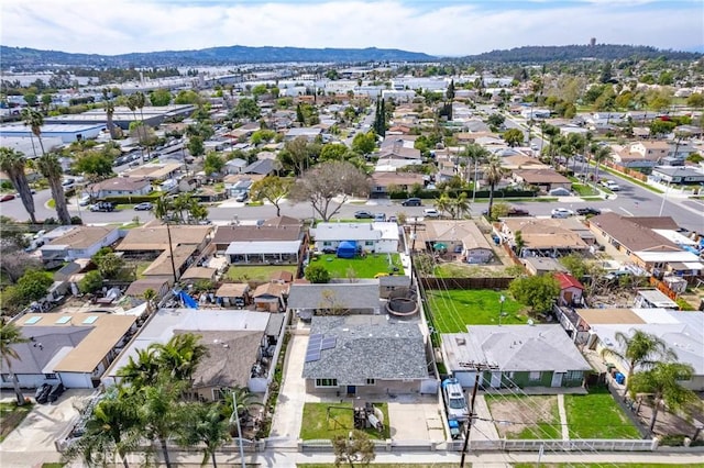 aerial view with a mountain view and a residential view