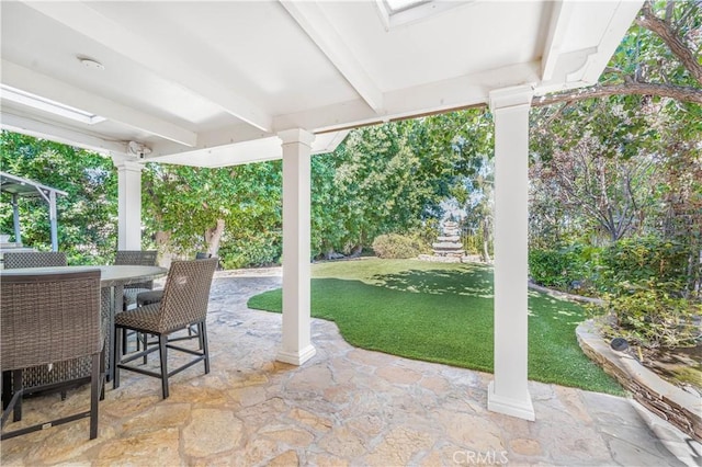 view of patio featuring outdoor dining space