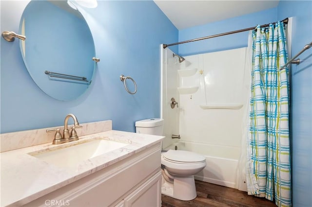 3690 S Bear St Unit 5, Santa Ana, CA 92704 - bathroom featuring shower / bath combo with shower curtain, toilet, wood finished floors, and vanity
