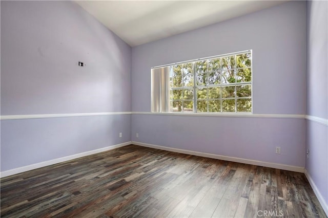 3690 S Bear St Unit 5, Santa Ana, CA 92704 - unfurnished room featuring baseboards and wood finished floors