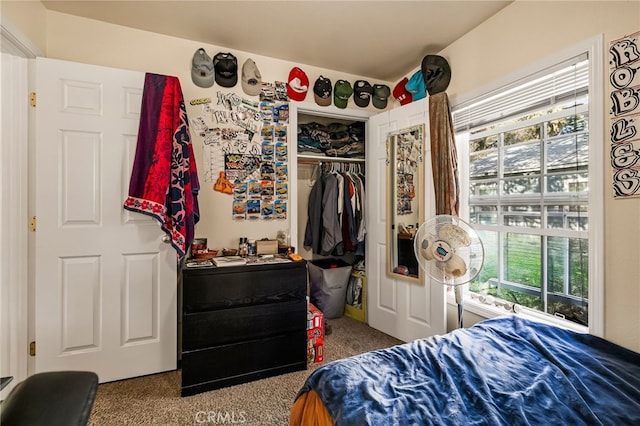 bedroom with a closet and carpet flooring