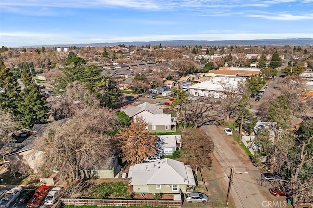 birds eye view of property with a residential view