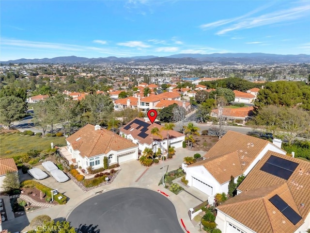 bird's eye view featuring a residential view and a mountain view