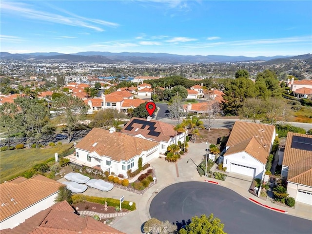 bird's eye view featuring a residential view and a mountain view