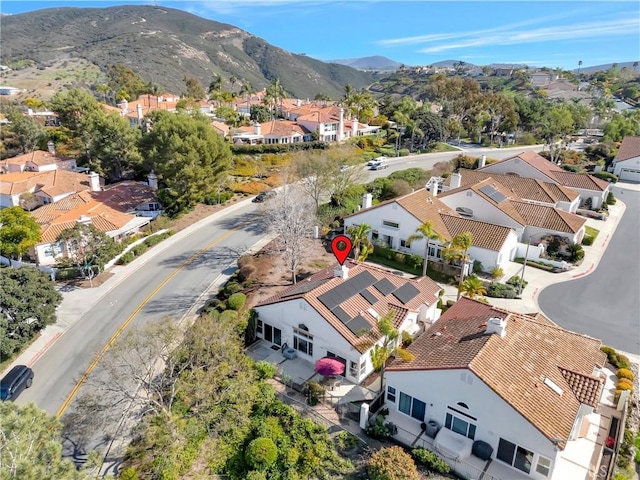 bird's eye view featuring a residential view and a mountain view