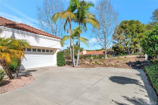 exterior space featuring a garage