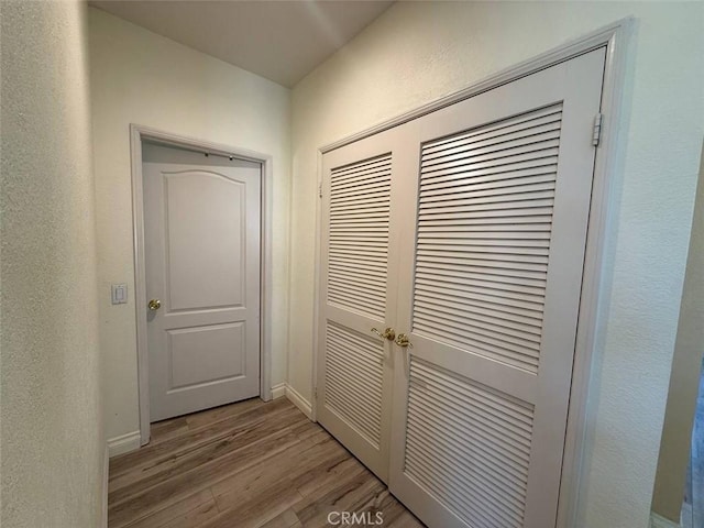 1268 Via, San Jacinto, San Marcos, CA 92078 - corridor with light wood-type flooring and a textured wall