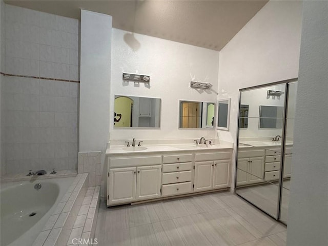 1268 Via, San Jacinto, San Marcos, CA 92078 - bathroom featuring double vanity, a garden tub, and tile patterned flooring