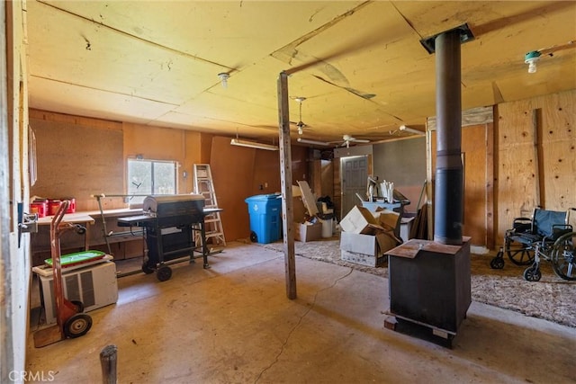 basement featuring a wood stove