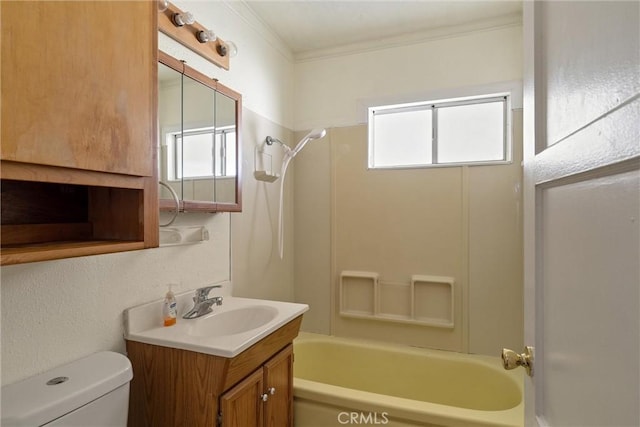 bathroom featuring toilet, vanity, and bathing tub / shower combination