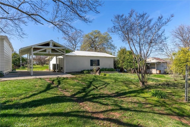 view of yard with a carport