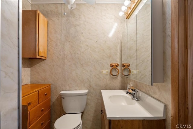 bathroom with toilet and vanity