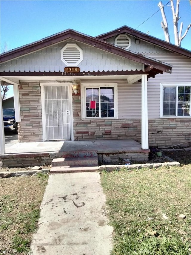 bungalow-style house featuring a porch