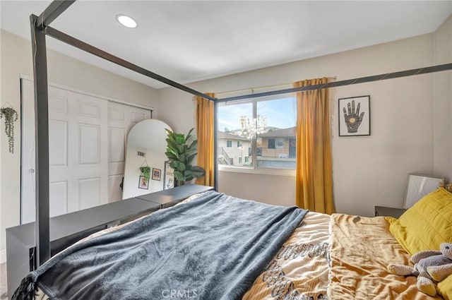 bedroom featuring a closet and recessed lighting