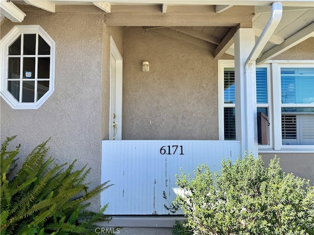 details featuring stucco siding