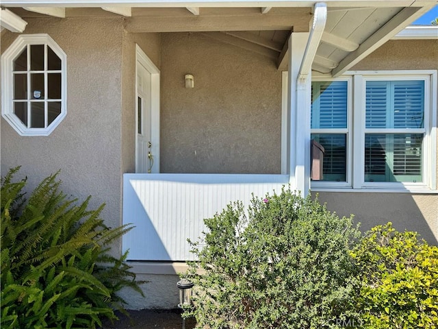 exterior space featuring stucco siding