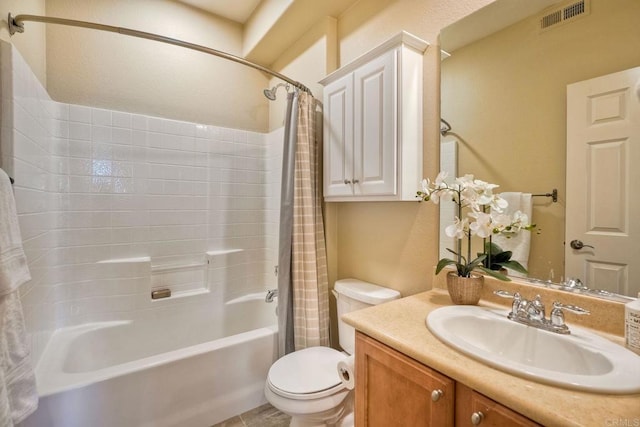 full bathroom featuring shower / bath combo, visible vents, vanity, and toilet