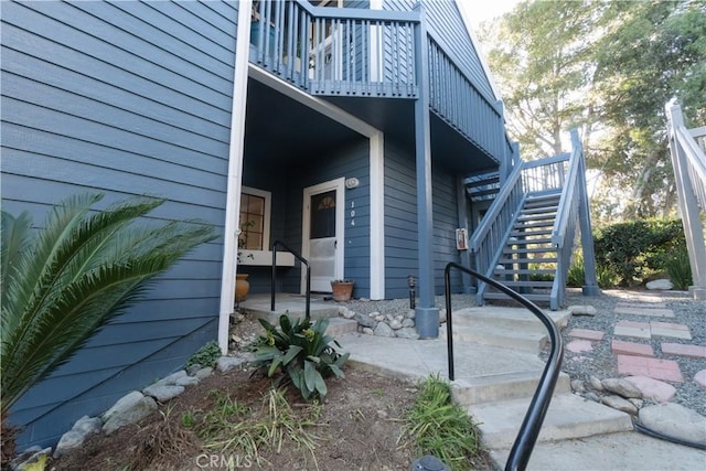 view of property exterior with stairs