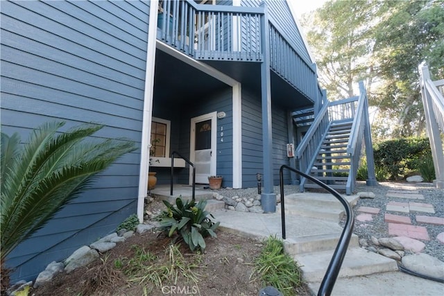 20271 Sealpoint Unit 104, Huntington Beach, CA 92646 - view of property exterior featuring stairway and a balcony