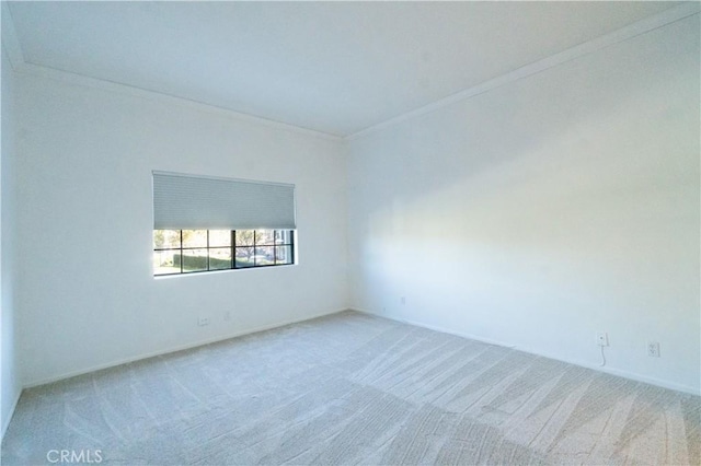 20271 Sealpoint Unit 104, Huntington Beach, CA 92646 - carpeted spare room featuring crown molding and baseboards