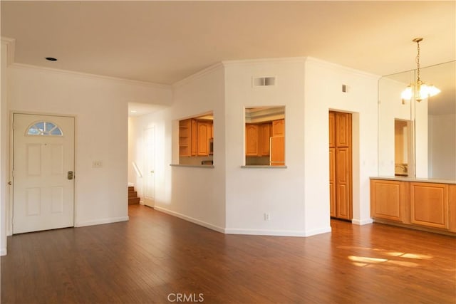 interior space featuring visible vents, baseboards, dark wood-style floors, stairs, and a chandelier