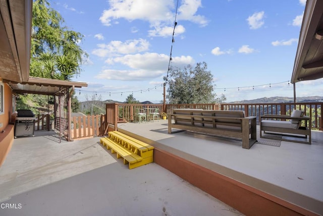 view of patio / terrace with a grill and an outdoor living space