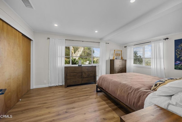 bedroom featuring vaulted ceiling with beams, recessed lighting, wood finished floors, visible vents, and access to exterior