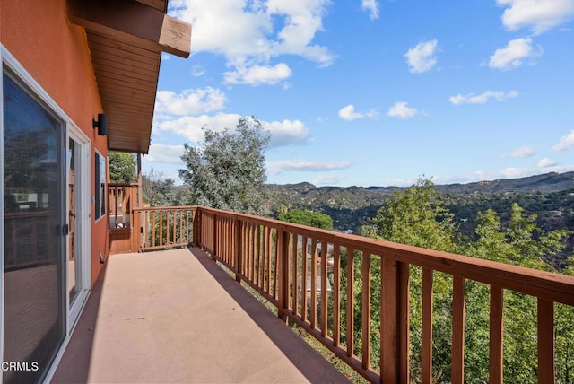 balcony featuring a mountain view