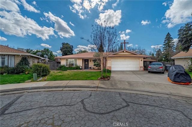 single story home featuring a garage, driveway, a front yard, and fence