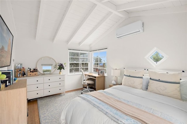 bedroom with an AC wall unit, vaulted ceiling with beams, baseboards, and wood finished floors