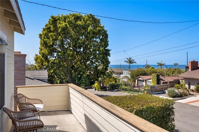 balcony featuring a residential view