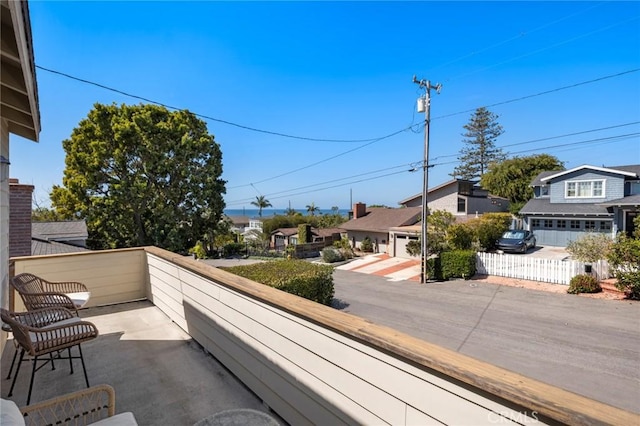 balcony featuring a residential view