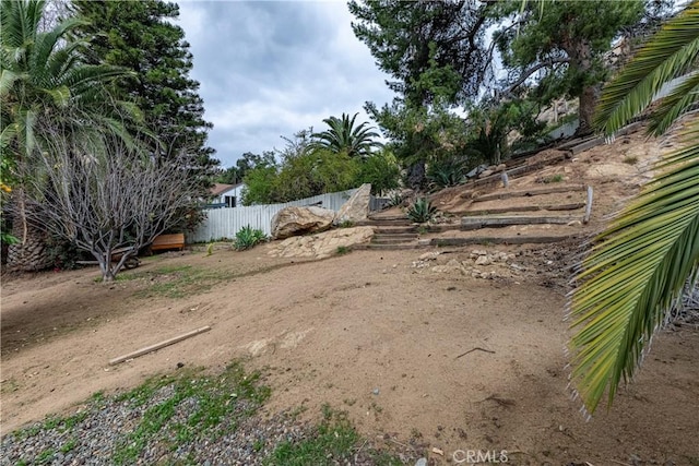 view of yard featuring fence