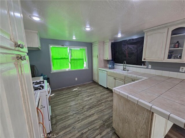 3269 Highcliff Rd, Riverside, CA 92506 - kitchen with white appliances, a sink, tile countertops, dark wood-type flooring, and a textured ceiling