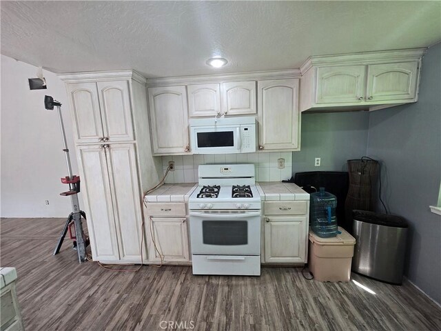 3269 Highcliff Rd, Riverside, CA 92506 - kitchen with white appliances, tile countertops, dark wood-style floors, a textured ceiling, and baseboards