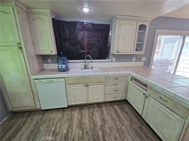 3269 Highcliff Rd, Riverside, CA 92506 - kitchen with dishwasher, a sink, dark wood-style floors, a textured ceiling, and glass insert cabinets