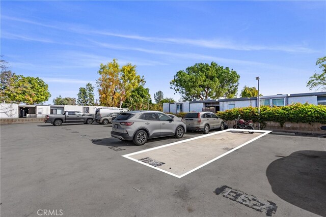 view of uncovered parking lot