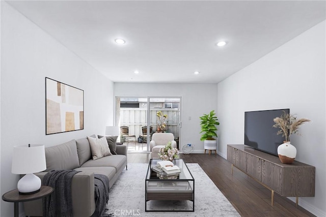 living room with baseboards, dark wood-style flooring, and recessed lighting