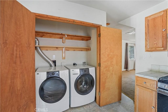 clothes washing area with laundry area and washing machine and dryer