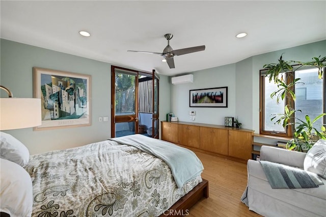 bedroom with access to outside, recessed lighting, ceiling fan, light wood-type flooring, and a wall mounted air conditioner