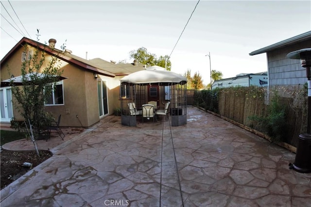 view of patio with fence