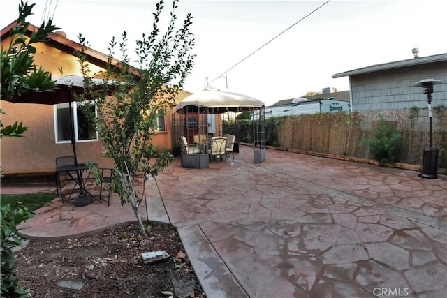 view of patio with fence