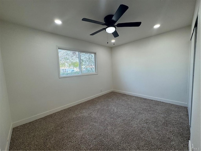 empty room featuring carpet, ceiling fan, baseboards, and recessed lighting