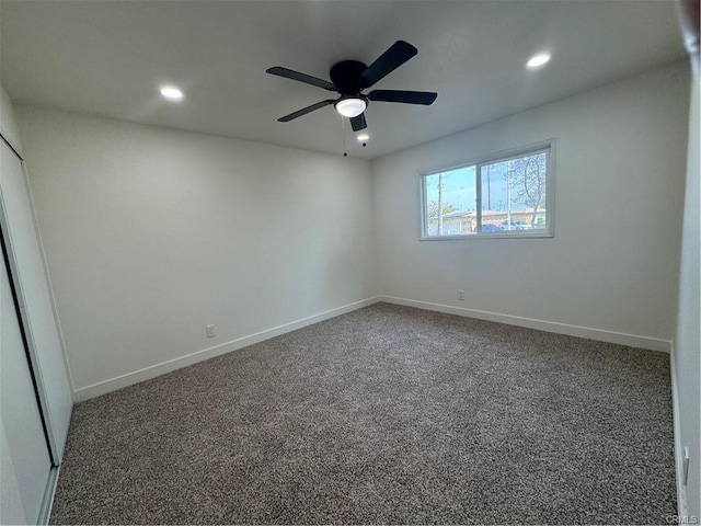 empty room with recessed lighting, carpet flooring, ceiling fan, and baseboards