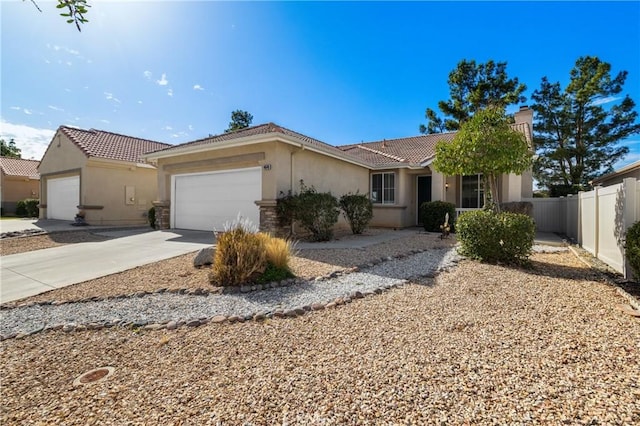 ranch-style house with stucco siding, concrete driveway, fence, a garage, and a tiled roof