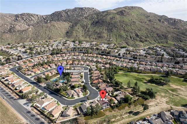 birds eye view of property featuring a residential view and a mountain view