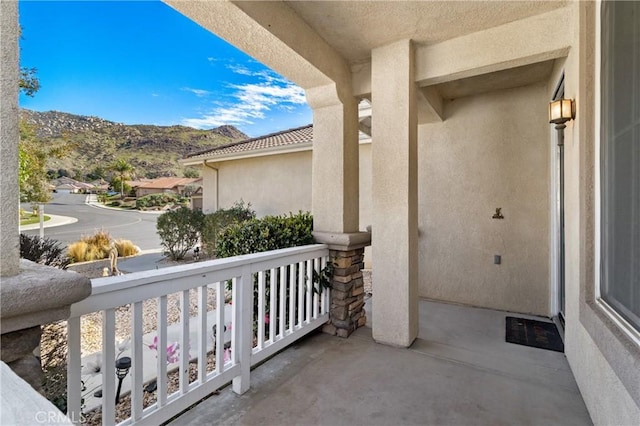 balcony featuring a mountain view